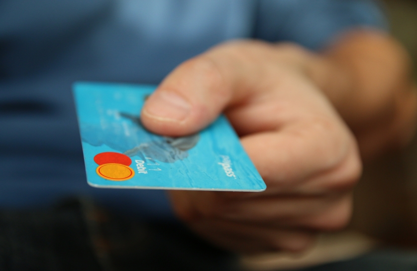 Hand holding a bank card