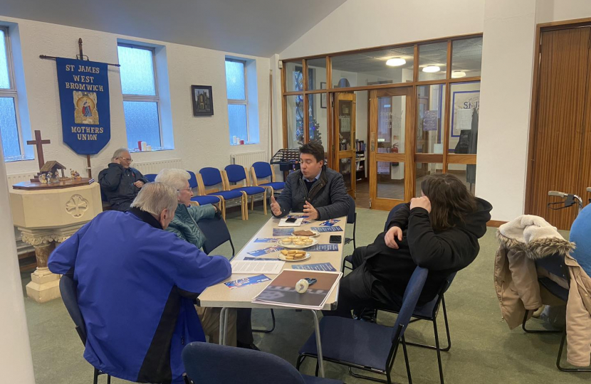 Shaun with residents discussing local issues